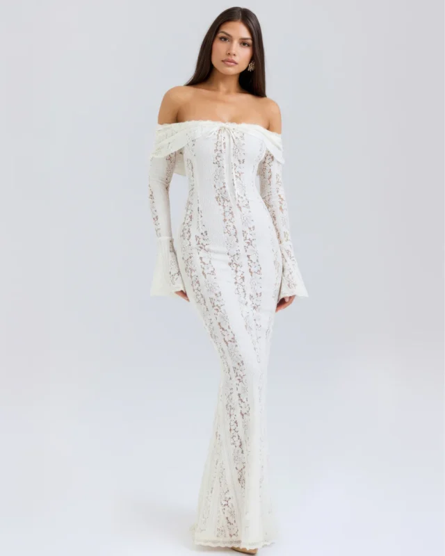 Front full-length perspective of a white lace bridal rehearsal dress, highlighting the bodycon hourglass tailoring, draped off-the-shoulder bardot neckline, and flared statement cuffs.