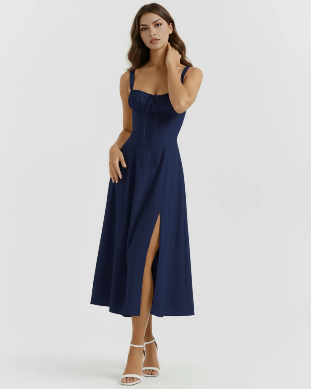 The Capri Lace-Up Side-Split Corset Darkblue Midi Dress 01 Front full-length portrait of the Capri dark blue midi dress, showcasing a structured corset bodice with a gathered milkmaid bust, tied neckline details, and a flowing skirt featuring a high thigh slit